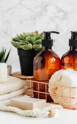 Soap,And,Shampoo,Bottles,And,Cotton,Towels,With,Green,Plant